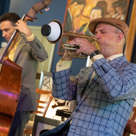 Tom Manuel playing trumpet