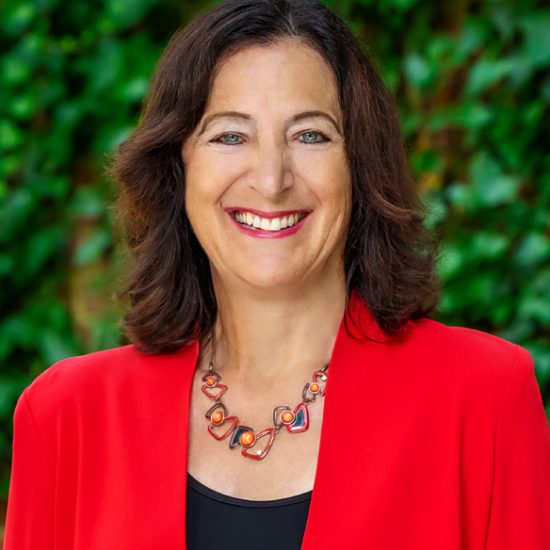 Andrea Goldsmith in red blazer
